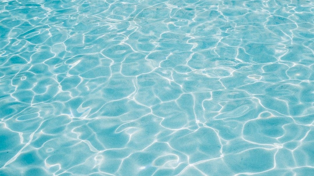 rippling crystal blue water