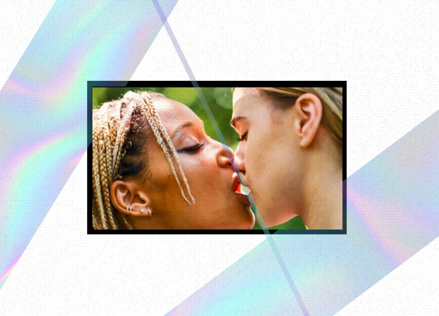 A screenshot of Amandla Steinberg and Maria Bakalova kissing. Their lips are touching and their mouths are open, as if breathing into one another’s mouths. The image is cropped in the center of the frame. Thin strips of groovy purple and blue bars cut across the rest of the frame. One slices between the two people.