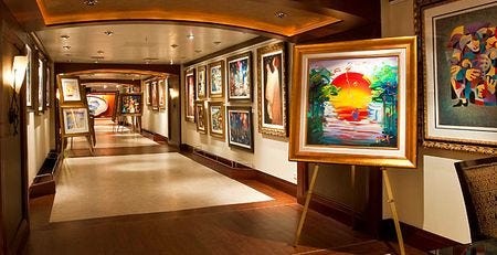 a group of pieces of art along the corridor walls on a cruise ship