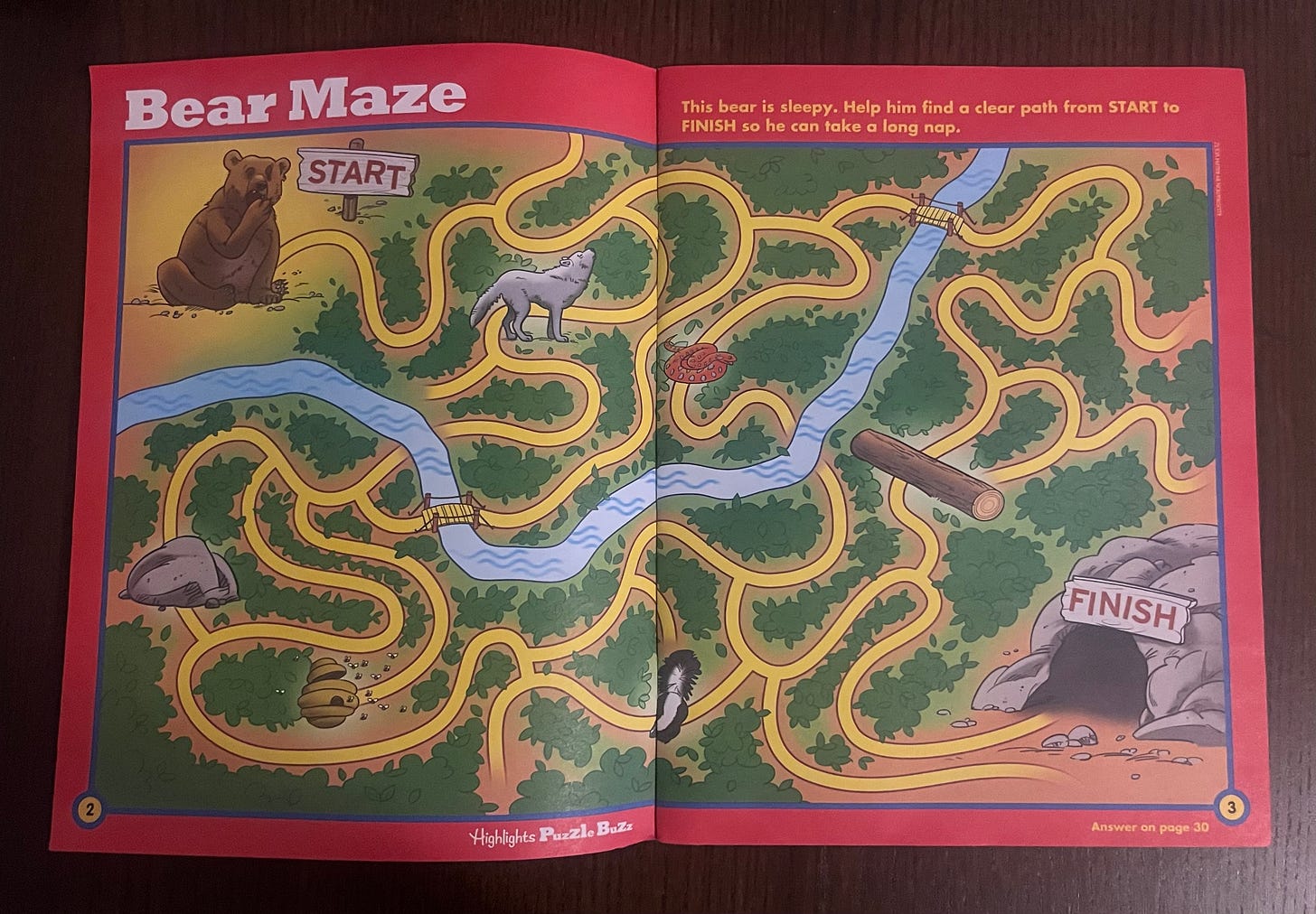 a maze in which a bear is trying to get to a cave