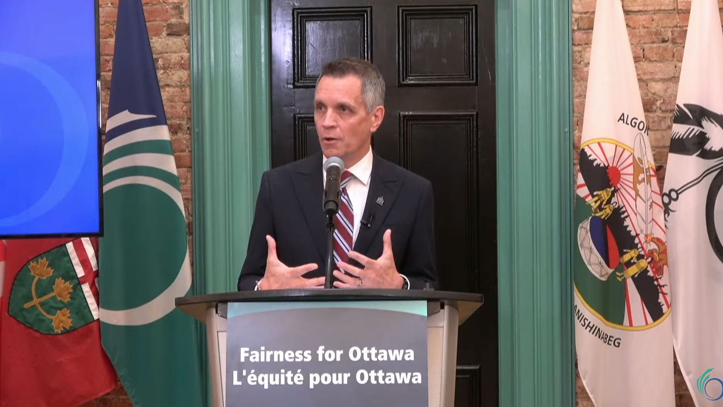 Mark Sutcliffe speaks to reporters at his office at City Hall on Thursday