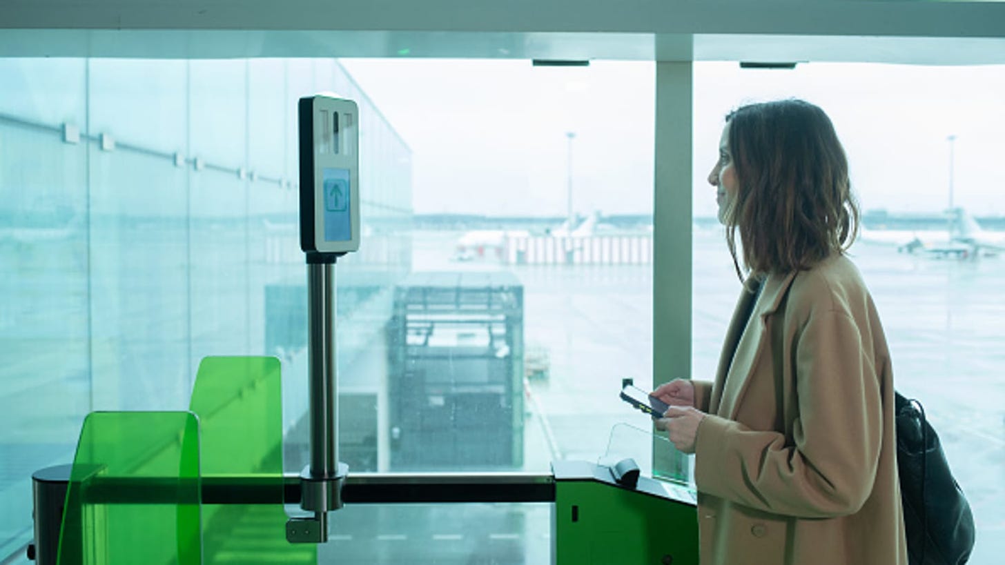 BARCELONA CATALONIA, SPAIN - JANUARY 19: A woman tests Vueling's new biometric recognition system at El Prat airport, January 19, 2023, in El Prat de Llobregat, Barcelona, Catalonia, Spain. Vueling has already introduced the facial recognition system that allows passengers to avoid having to take their documents from the security checkpoint until they access their flight, thus speeding up the boarding process. The company has defined itself as the "first airline" to develop voluntary facial recognition in S