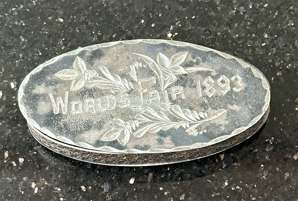 A small pewter box from the 1893 World's Fair