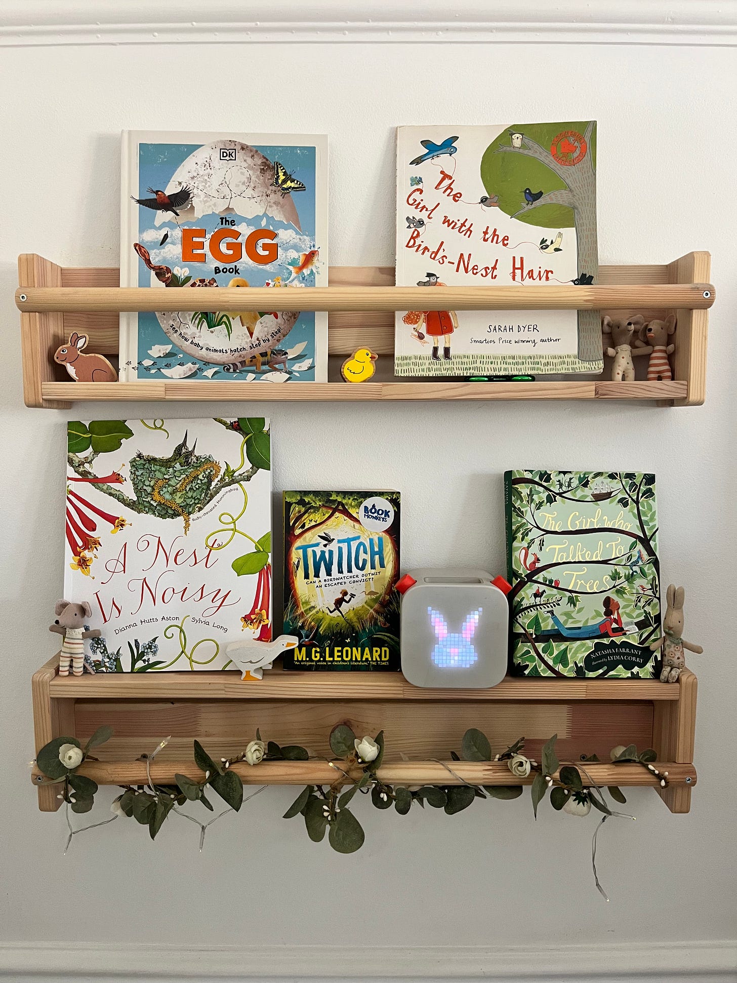 kids spring books on a shelf