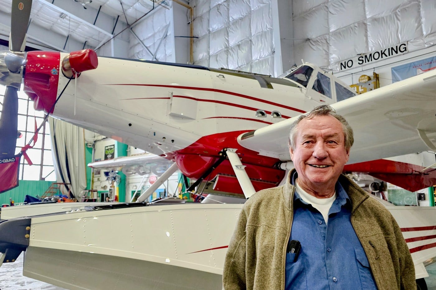 Joe McBryan stands in front of a dual-seat Air Tractor AT-802 at Buffalo Airways' Yellowknife hangar. Ollie Williams/Cabin Radio