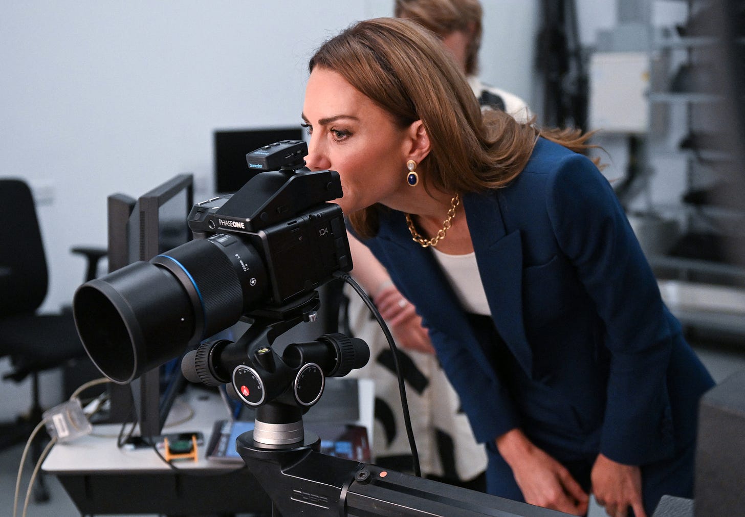 Princess Catherine looking through viewfinder