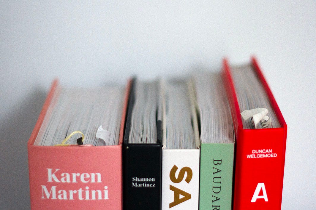 The very tops of a collection of cookbooks.