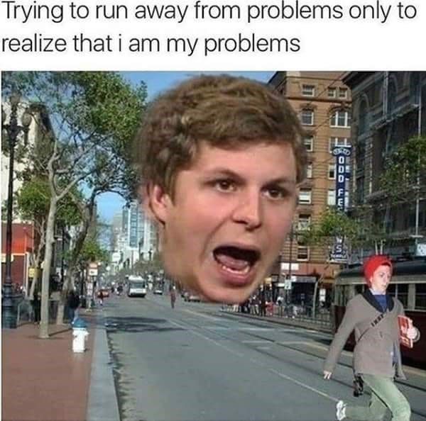 Funny meme that reads, "Trying to run away from my problems only to realize that I am my problems" above an image of Michael Cera running away from himself