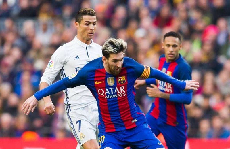 lionel messi pushing cristiano ronald out of way soccer