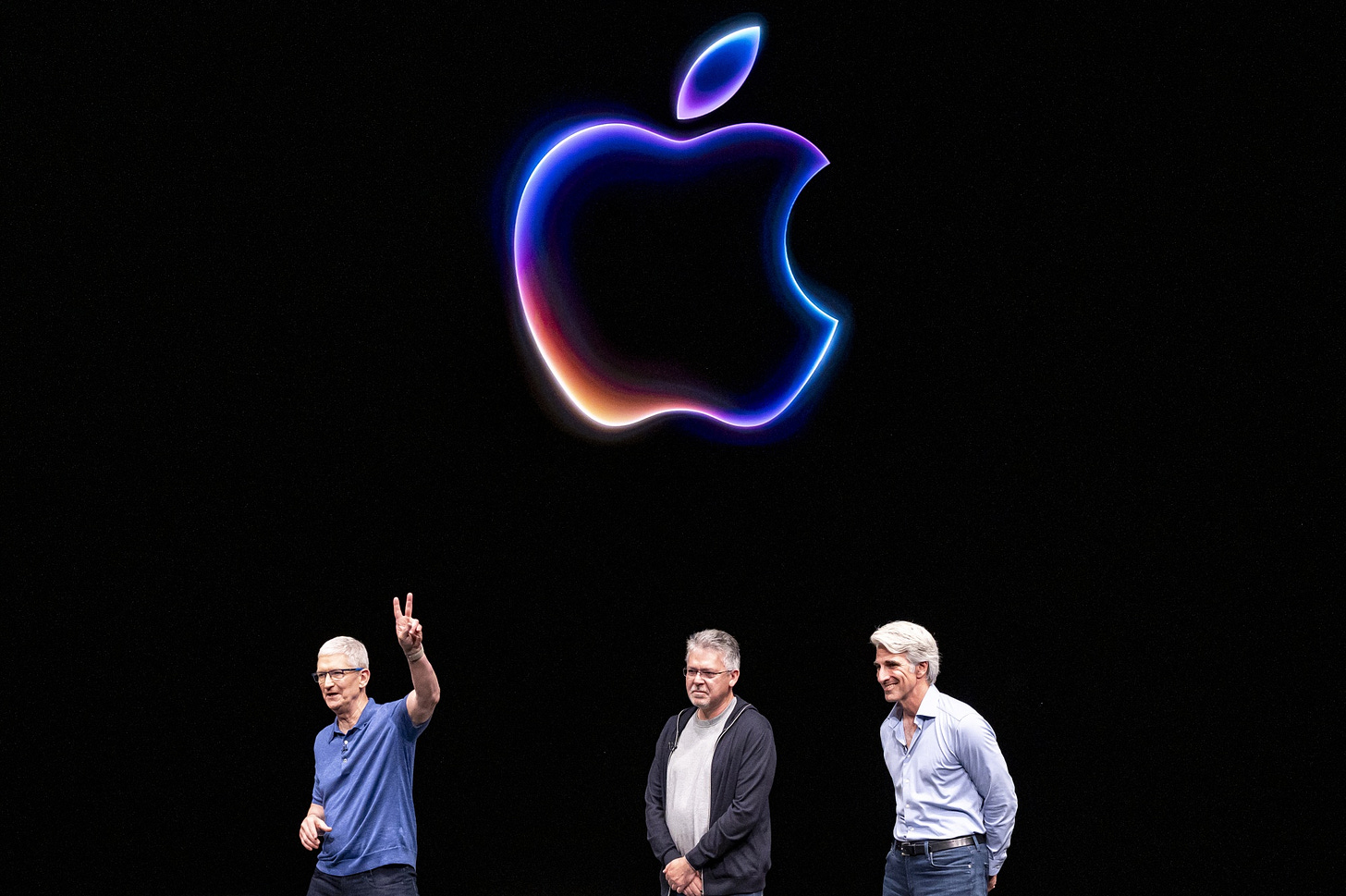 Tim Cook, from left, John Giannandrea and Craig Federighi during the Apple Worldwide Developers Conference at Apple Park campus in Cupertino on&nbsp;June 10.