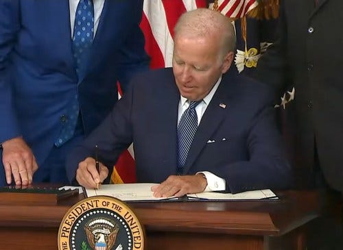 Biden signs into law the Inflation Reduction Act