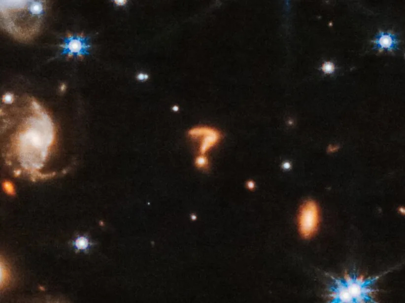 The "cosmic question mark" in an image taken by the James Webb Space Telescope NASA, ESA