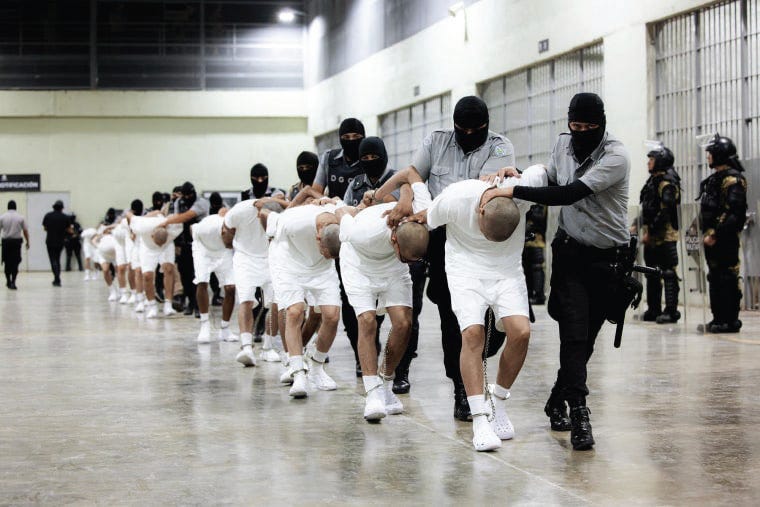 Men who the American regime claims are affiliated with the Venezuelan gang Tren de Aragua arrive in the Tecoluca, El Salvador concentration camp. Men who the American regime claims are affiliated with the Venezuelan gang Tren de Aragua arrive in the Tecoluca, El Salvador concentration camp.