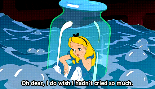 alice in wonderland inside a glass bottle floating down a river of her own tears