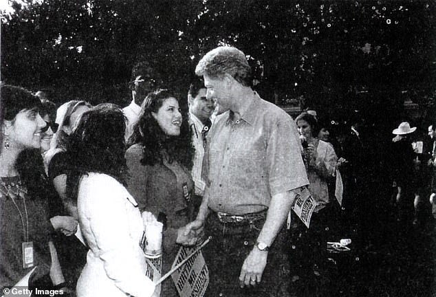 A photograph showing former White House intern Monica Lewinsky meeting President Bill Clinton at a White House function submitted as evidence in documents by the Starr investigation and released by the House Judicary committee September 21, 1998