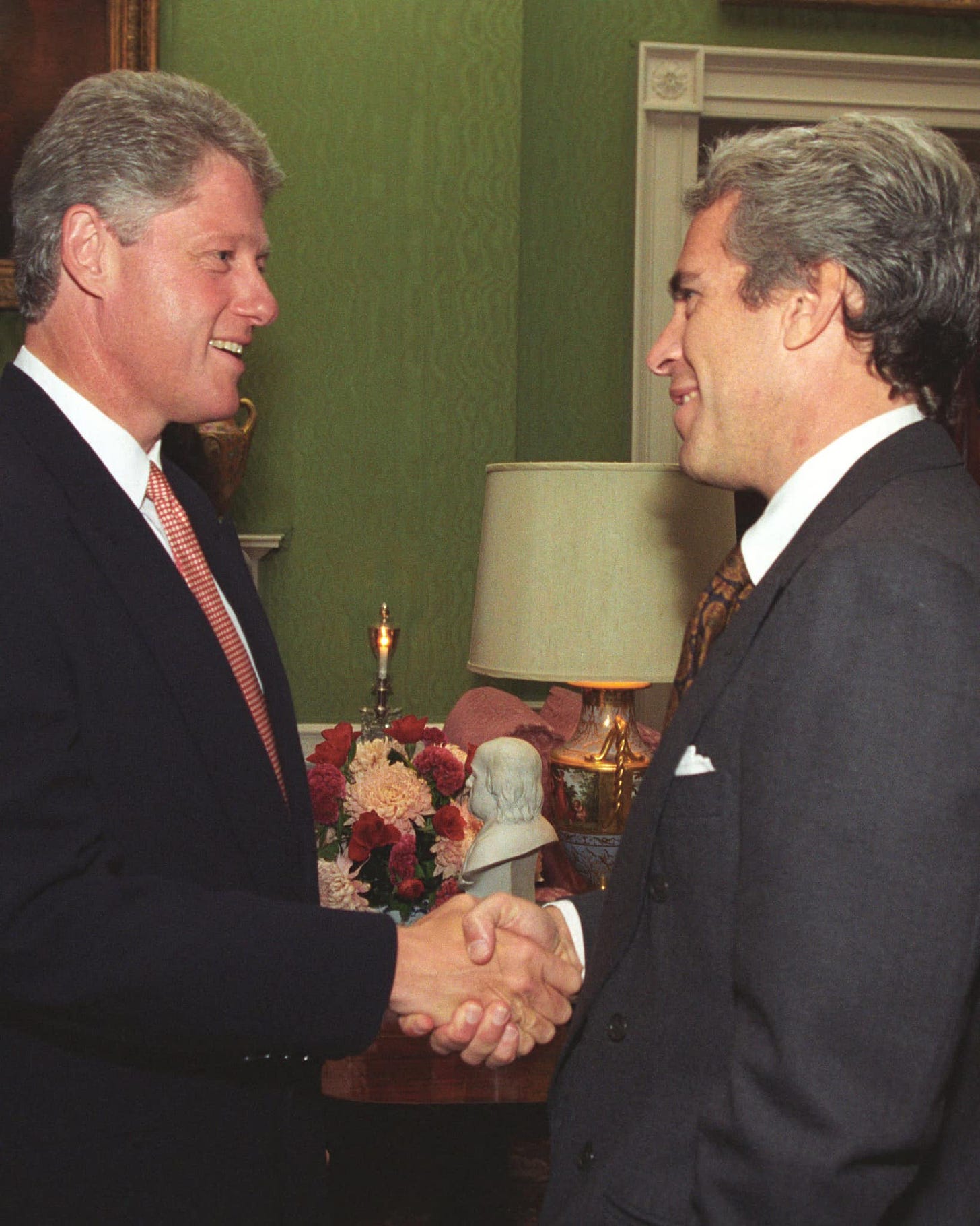 May be an image of 2 people and the Oval Office