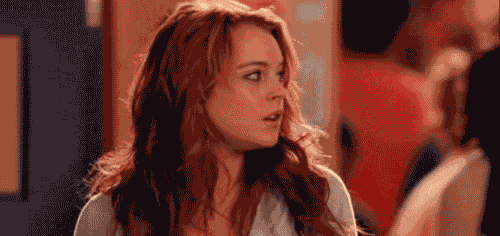 GIF of Cady falling into a trash can
