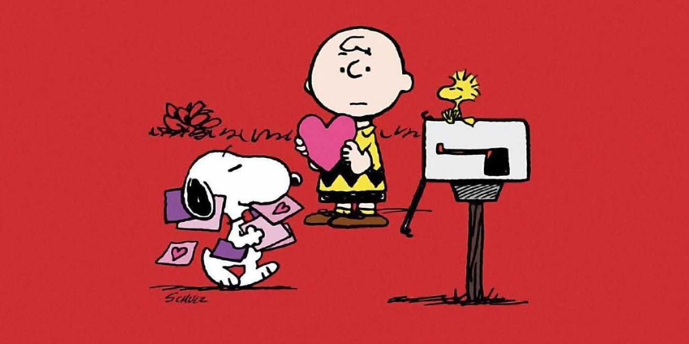 Snoopy going to mailbox with valentines while Woodstock and Charlie Brown watch.