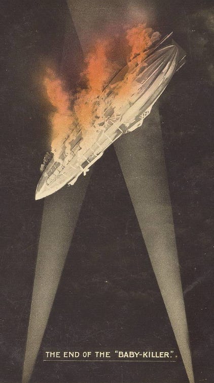 A dramatic painting of a Zeppelin transfixed between a “v” of searchlight beams as it bursts into flames, all against a black background. The text below says THE END OF THE “BABY-KILLER”