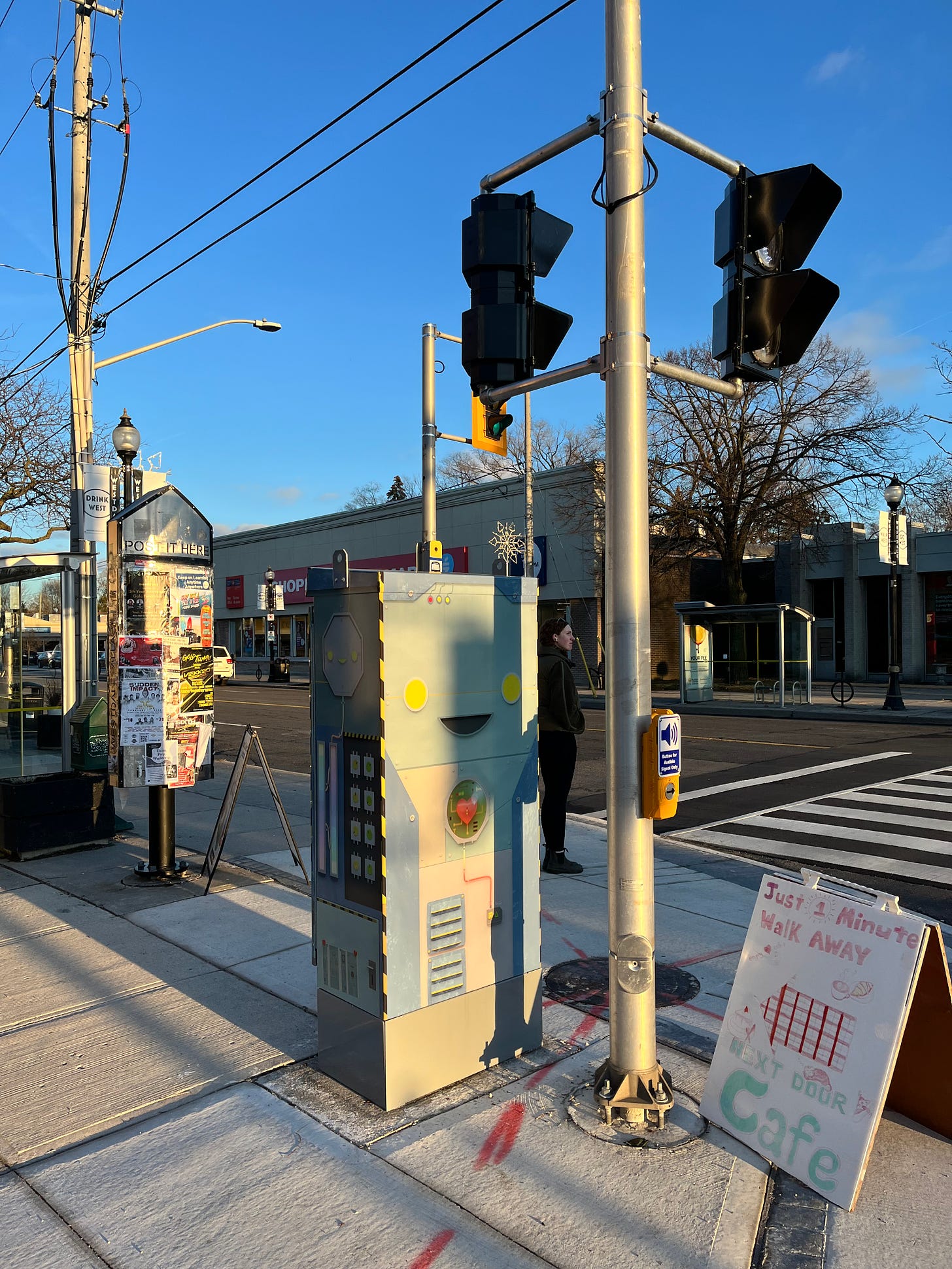 Traffic Signal Cabinet on the street corner in sunset lighting.