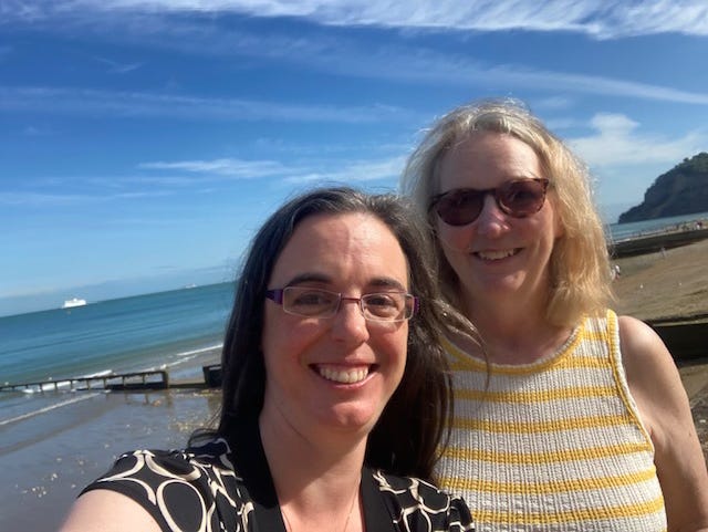 Mid shot portrait of Vicki & Wendy by the sea on the Isle of Wight