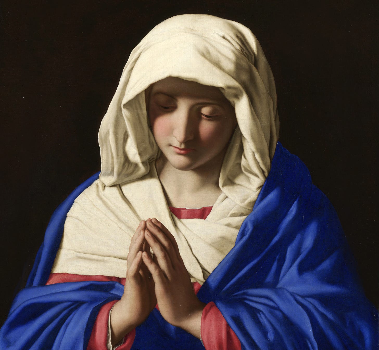 Virgin Mary hands folded in prayer blue mantle white head covering