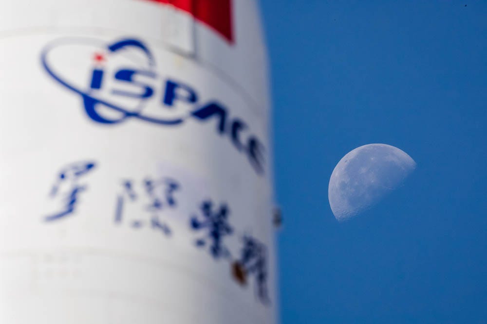 i-Space’s Hyperbola-1 launch vehicle on the launch pad with the Moon in the background.