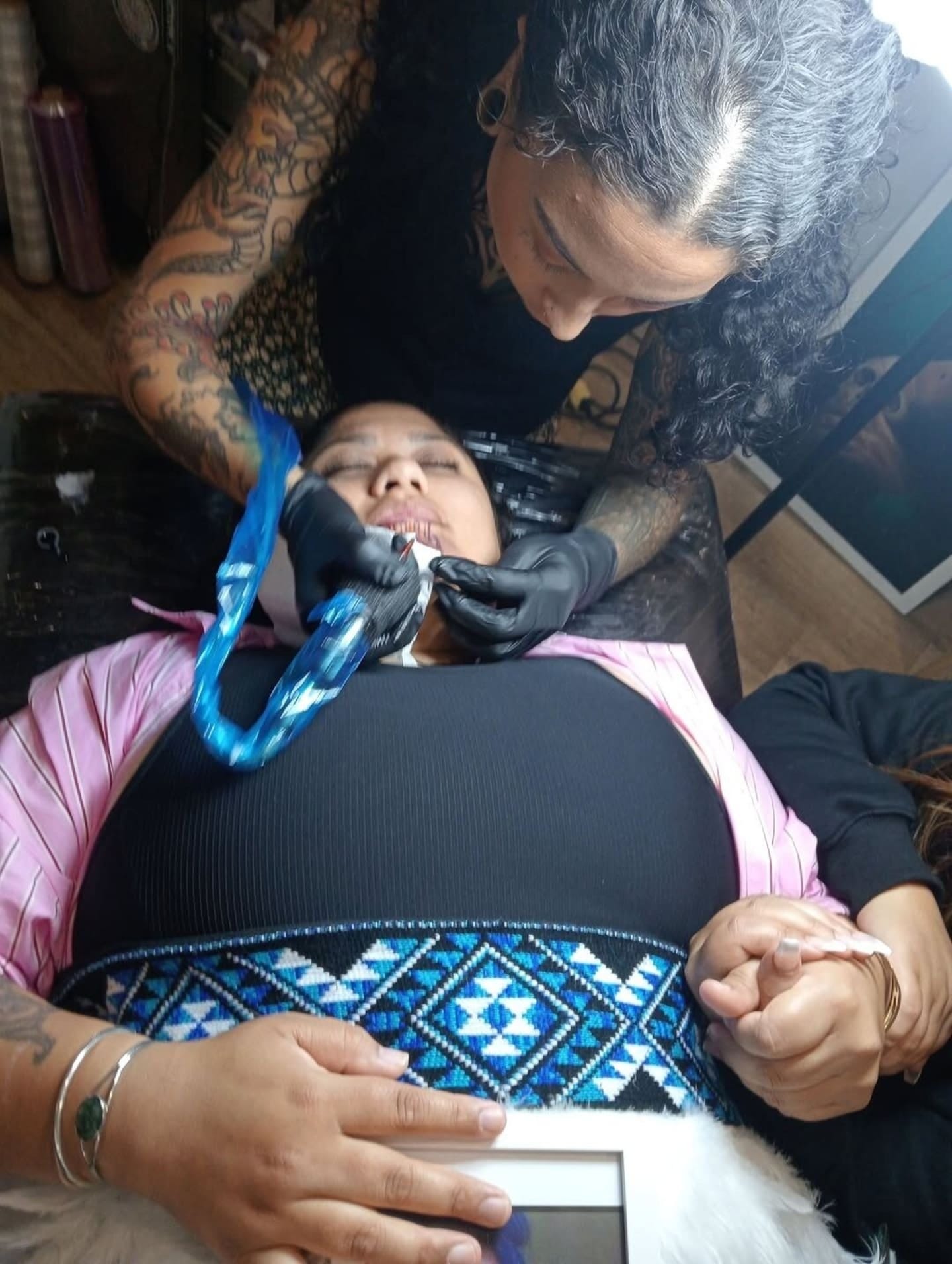  Mary Parkinson Peni getting her moko kauae in January. Image supplied. 14 May 2025.
