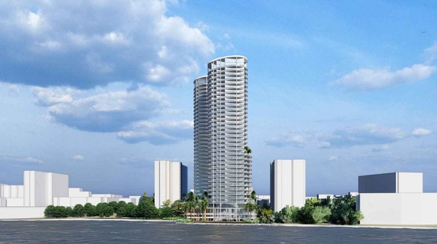 A rendering of twin 35-story towers proposed by developer Moises Agami for 420 Bay Ave. in downtown Clearwater. The buildings would rise 470 feet — more than twice as tall as the assisted living facility to the north, at left, and condo to the south.