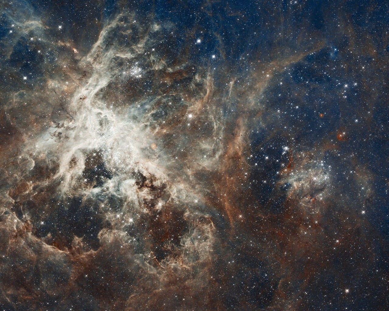 nebula and star clusters in a backdrop of space