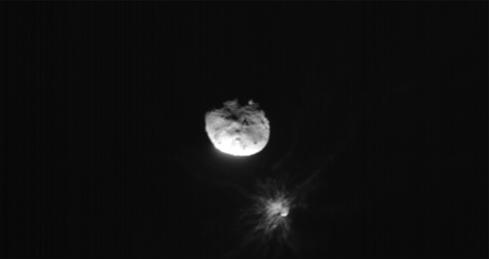 ASI’s LICIACube satellite acquired this image just before its closest approach to the Dimorphos asteroid, after the Double Asteroid Redirect Test, or DART mission, purposefully made impact on Sep. 26, 2022. Didymos, Dimorphos, and the plume coming off of Dimorphos after DART impact are clearly visible.