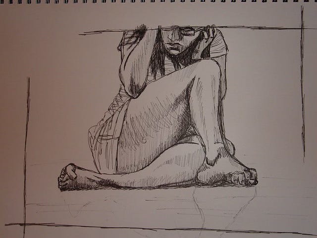 A pencil sketch of a depressed woman.