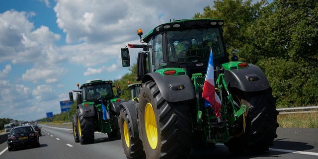 Demonstrating farmers slow down traffic on a motorway near Venlo, Netherlands, on July 4, 2022.