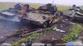 Russian soldiers show off ‘graveyard’ of US Bradleys (VIDEO)