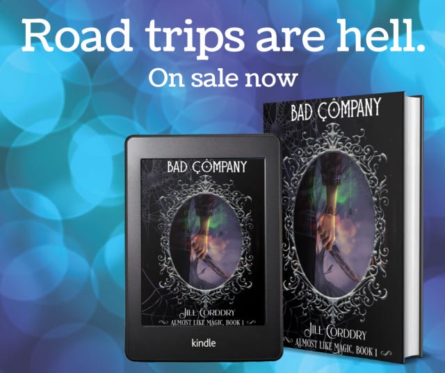 Image shows a kindle e-reader and a paperback book with the cover of Bad Company, Almost Like Magic, book 1 on a background of teal and purple circles. The header says Road trips are hell. On sale now