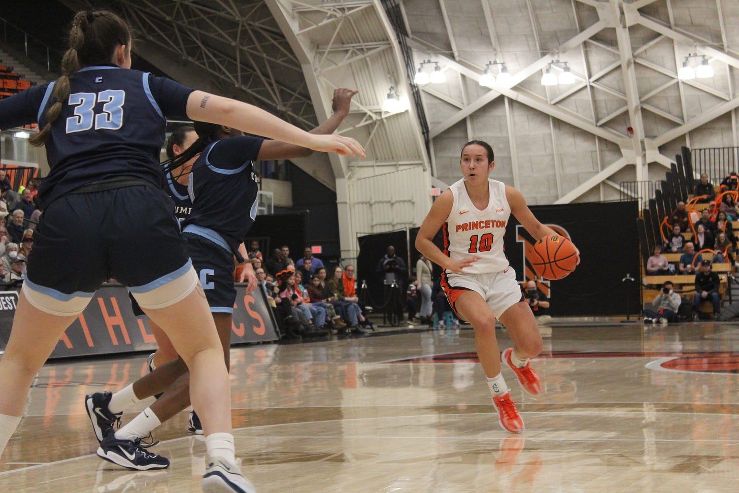 Princeton’s Skye Belker drives with the ball against Columbia on Jan. 20, 2024. (Photo by Adam Zielonka)