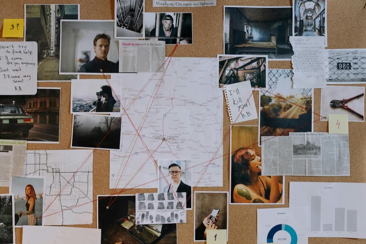 a conspiracy theorist's "evidence board" replete with red string connecting all of the various photographs, news clippings, and notes to one another a conspiracy theorist's "evidence board" replete with red string connecting all of the various photographs, news clippings, and notes to one another