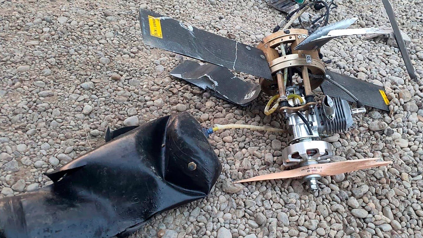 The wreckage of a drone is seen at Baghdad airport, Iraq, Monday, Jan. 3, 2022. Two armed drones were shot down at the Baghdad airport on Monday, a U.S.-led coalition official said, an attack that coincides with the anniversary of the 2020 U.S. killing of a top Iranian general. (International Coalition via AP)