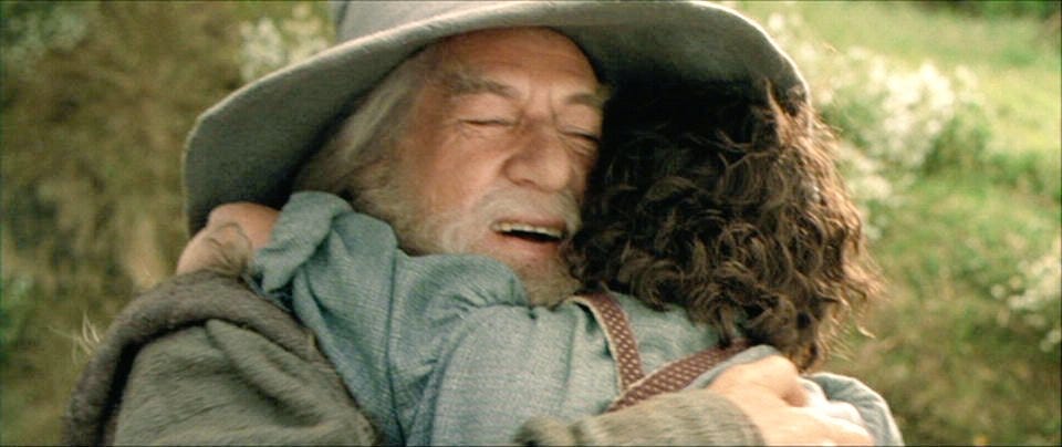 Gandalf hugging Frodo