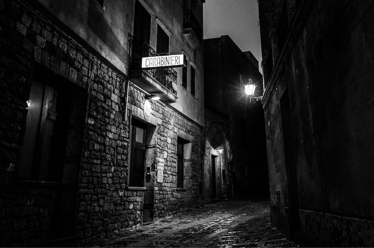 Dark alley in a city at night