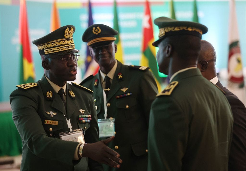 West African leaders came together held an emergency summit to discuss the coup in Niger session in Abuja in in August. (Kola Sulaimon—AFP / Getty Images)