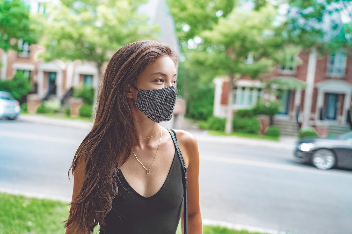 Woman wearing a mask.