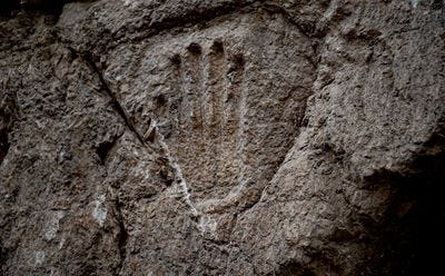 Mysterious hand print ancient moat Jerusalem