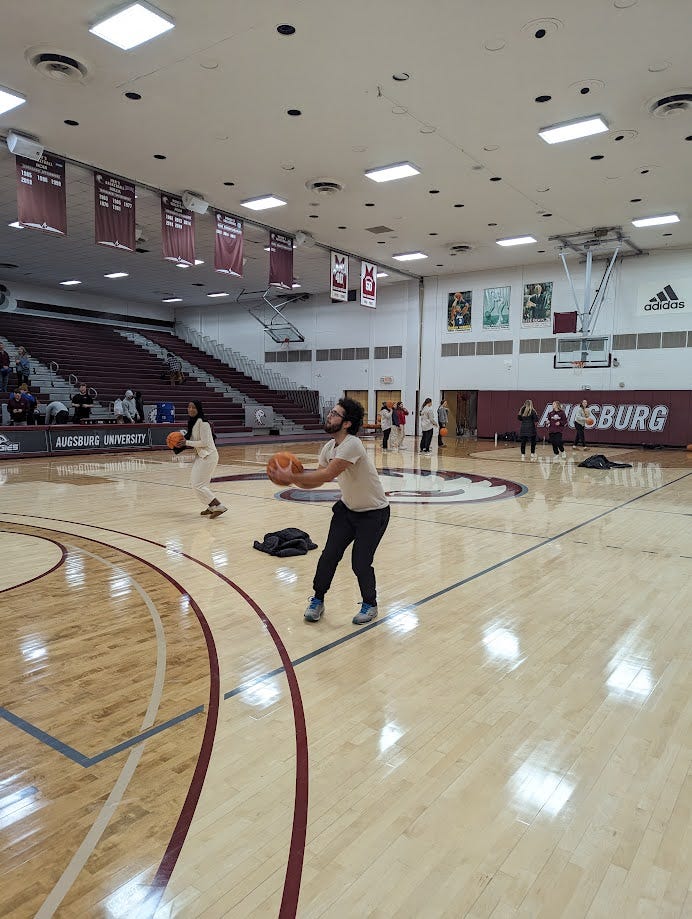 Eli shooting a basketball