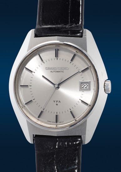 A very precise and rare stainless steel wristwatch with center seconds and date