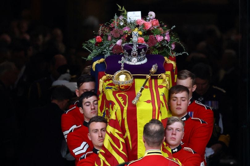 Queen's coffin bearers were specifically chosen to protect her body ...