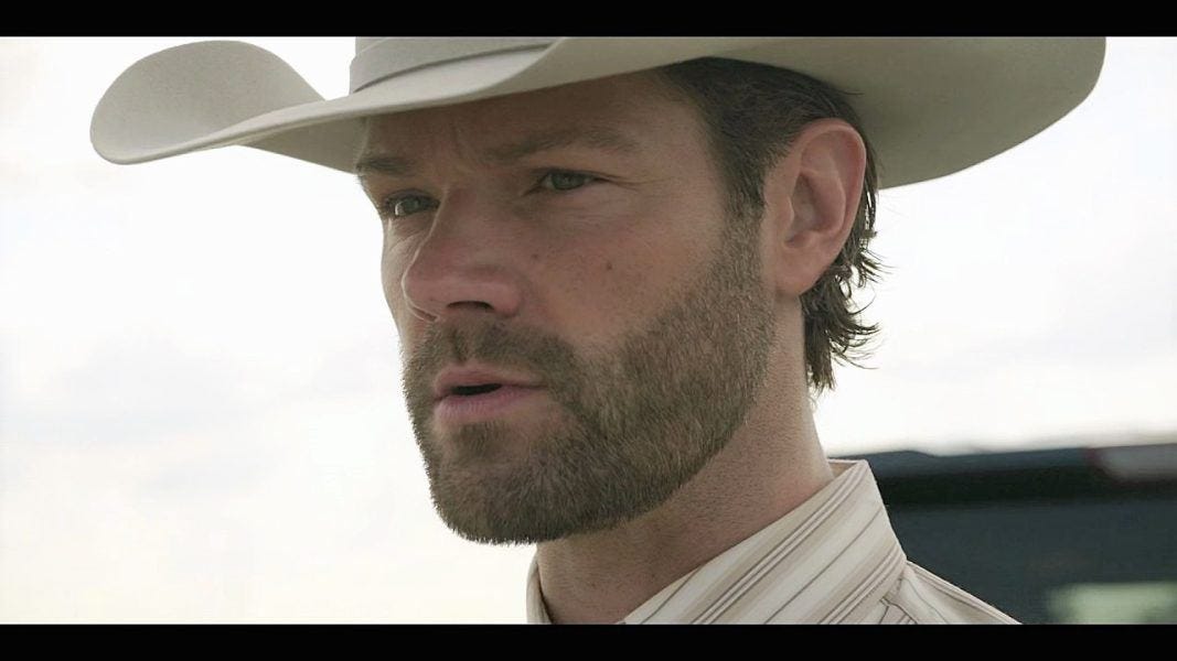 Jared Padalecki in Texas Rangers white hat looking concered 3.5.