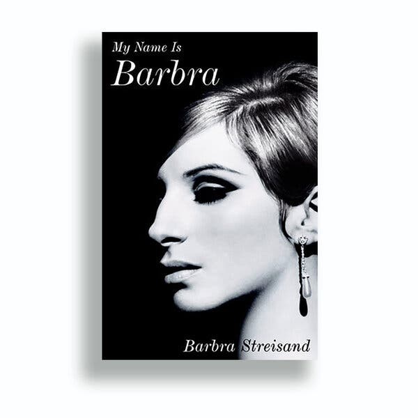 The book cover for “My Name Is Barbra” shows a dramatic black and white portrait of a 1960s-era Barbra Streisand in profile. Her hair is swept up, she has long dangly earrings and is wearing a severe cat eye as her makeup.