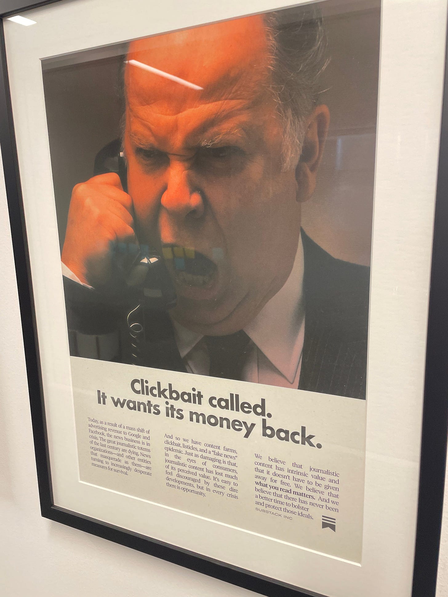 Clickbait called wall poster at Substack HQ