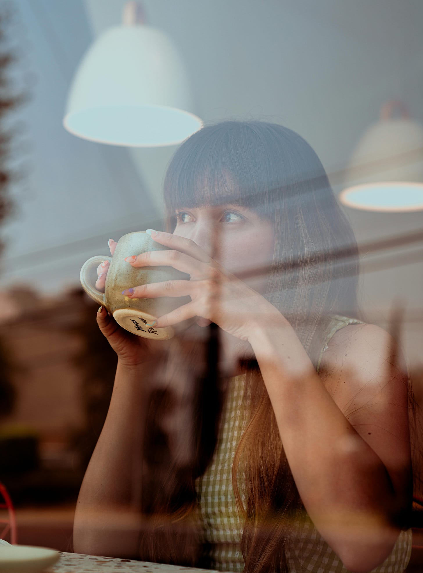 Woman drinking coffee